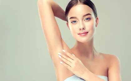 Woman has pristine skin and clean armpit after laser treatments in Elm Grove.